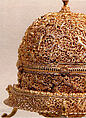 Goa Stone and Gold Case, Container: gold; pierced, repoussé, with cast legs and finials
Goa stone: compound of organic and inorganic materials